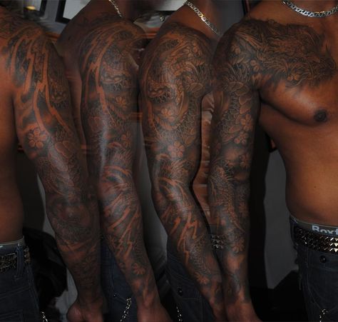 Dark Skin Sleeve Tattoo, Darker Skin Tattoos, Black Man Tattoo Sleeve, Tattoos On Dark Skin Black Men, Chest And Arm Tattoo Men, Black People Tattoos Dark Skin, Dark Skin Men With Tattoos, Colored Tattoos On Dark Skin, Black Men Tattoos Sleeve