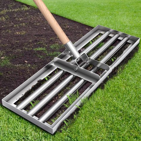 PRICES MAY VARY. 【Stainless Steel Ground Plate Leveler Rake】 The 30"x 10" flat lawn leveling rake base is made by 3mm thickened stainless steel without coating, which prevents rust and gives you confidence to be used for a long time.We use advanced welding technology on the rake to avoid you from falling off during use. 【Comfortable & Effort-Saving Wooden Handle】Leweio leveling rake tool designed a 78 inch(6.5 ft) length and diameter is 35 mm(1 3/8") solid not easily broken wooden handle, which Diy Lawn Leveling Tool, How To Fix Lawn, Laying Sod Diy Tips, How To Fix Patchy Grass Lawn, Rake Tool, Lawn Leveling, Landscape Yard, Welding Technology, Garden Rake