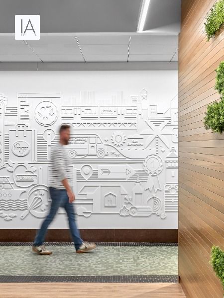 Raised white iconography behind a wooden wall help to tell the story of the Home Chef brand Office Graphic Wall, Environmental Graphic Design Wall, Office Branding Wall, Office Design Concepts, Experiential Graphics, Brand Wall, Office Wall Graphics, Experiential Graphic Design, Tech Office