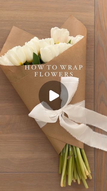 THE SUFFOLK NEST Ashlee Jane on Instagram: "How to easily wrap flowers 🤍 One to save for when you gift flowers to a loved one. #wrappingflowers #whiteflowers #tulipseason #springblooms #springflowers #tulips #tuliplove #wrapping #diywrapping #giftwrapping #giftwrap #giftwrappingideas #giftwrappingskills" Tela, Spring Gift Wrapping Ideas, Flowers Wrapped In Tissue Paper, Brown Wrapped Flowers, Craft Paper Flower Wrapping, How To Wrap Flowers In Brown Paper Bag, Easy Way To Wrap Flowers, How To Wrap Tulips Bouquets, Paper Wrapped Flowers Bouquets