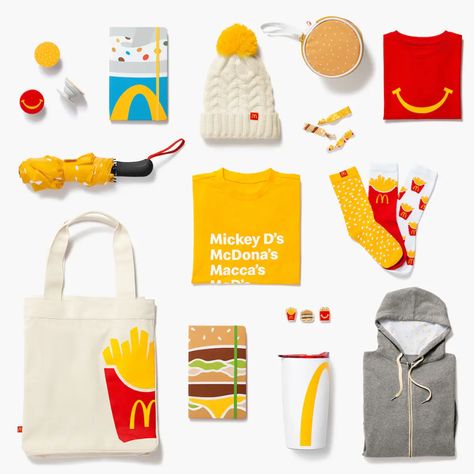 The new McDonald's clothing and gifts line features a Big Mac bag - Insider Marketing Merchandise, Pr Kit, Swag Ideas, Ugly Holiday Sweater, Merchandise Shop, Keep The Lights On, Creative Packaging, Holiday Items, Merchandise Design