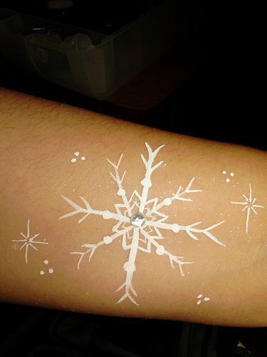 Snowflake | Tania Cuthbertson | Flickr Snowflake Tattoos, Frozen Face Paint, Painting Snowflakes, Snowflake Tattoo, Adult Face Painting, Christmas Face Painting, Frozen Face, Snow Flake Tattoo, Cheek Art