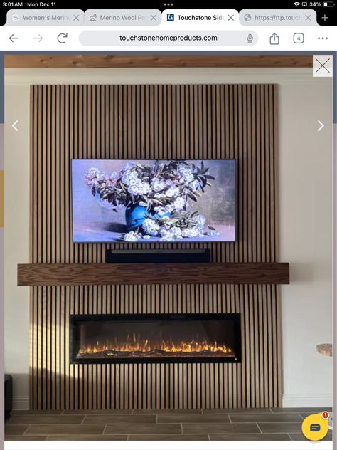 Wood Slat Wall With Electric Fireplace, Tv Wall Features Ideas Living Room, Slat Wall With Tv And Fireplace, Ethanol Fireplace Living Room Wall Mount, Wall Tv Fireplace Ideas, Panel Wall With Tv And Fireplace, Slat Wall For Tv, Slat Wall Living Room Fireplace, Wood Panel Fireplace Wall Diy