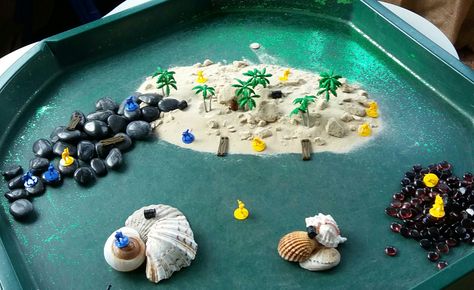 Eyfs tuff tray Pirate desert island Africa Tuff Tray, Seaside Tuff Tray Eyfs, Beach Tuff Tray, Ocean Themed Tuff Tray, Sharing A Shell Tuff Tray, Cook Island, Eyfs Classroom, Tuff Tray, Tray Ideas