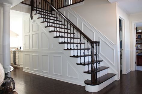 5 Stunning Stairway Trends for Your Home | The Money Pit Stairway Wainscoting, Indoor Stair Railing, Stair Railing Makeover, Stairs Renovation, Diy Staircase, Iron Staircase, Iron Stair Railing, Wrought Iron Stairs, Stair Railing Design