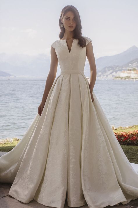 Regal and elegant cap sleeve wedding ballgown composed of rich jacquard and opalescent silk mikado | wedding, bridal inspo, bridal outfit, wedding dress ideas, wedding gown inspo, 2024 wedding, luxury wedding dress, designer wedding dress, lace wedding dress, dream wedding dress, cap sleeve, elegant wedding dress, fall wedding, spring wedding dress, 2024 bride, jacquard wedding dress, nontraditional wedding dress, mother of the bride gown, conservative wedding gown #weddingdress #wedding #bride Allure Dress, Nontraditional Wedding Dress, Ballgown Wedding Dress, Allure Couture, Ballgown Wedding, Spring Wedding Dress, Mother Of The Bride Gown, Allure Bridals, Allure Bridal