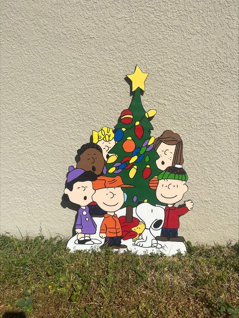 Welcome this Peanuts Christmas Yard Sign to your front lawn today! These are handcrafted Yard signs using 1/2 plywood, hand painted with acrylics and then coated with Rustoleum Clear Coat which is applied to the front and back to help with weather protection. The backs are painted with grey paint. **These signs do not come with a stand included, however they will stand up if they have something to lean on.** Exact Measurements: 36 inches high Please note that these items are made out of wood and are hand painted. While each is given a Clear Coat of Rustoleum for protection, this shop can make no guarantees as to how an item will stand up to weather conditions in your area. MADE TO ORDER- Please order early so you have it when you need it. Custom orders are always welcome. Have a clipart im Christmas Wood Cutouts Yard Art Lawn Decorations, Christmas Yard Art Wooden Patterns, Christmas Yard Art Wooden, Plywood Christmas Yard Decorations, Christmas Wood Cutouts Yard Foto Art, Snoopy Yard Art Christmas, Yard Decor Christmas, Christmas Wood Cutouts Yard Art Sculptures & Statues, Wooden Yard Decorations