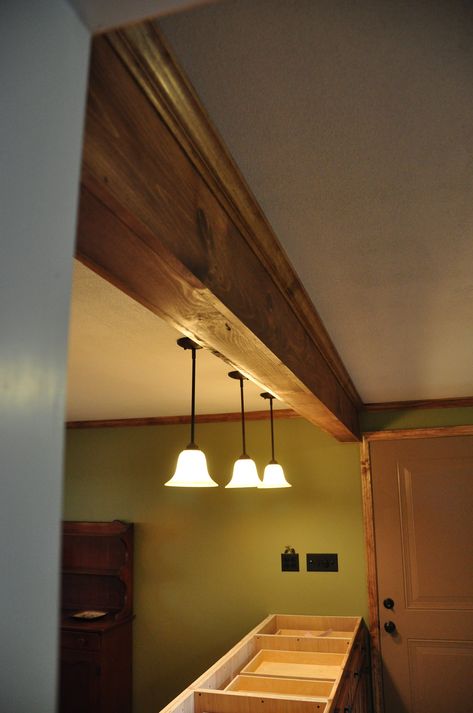 Pine-wrapped LVL Beam w/ Pine Crown Molding | Steve Erwin | Flickr Stained Crown Molding Wood Trim, Steve Erwin, Lvl Beam, Wood Crown Molding, Wood Beams, Crown Molding, Summer House, Beams, Molding