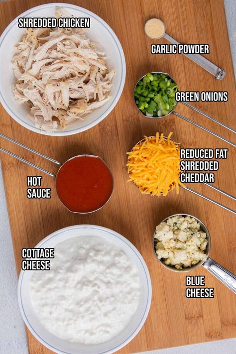 This healthy buffalo chicken dip recipe is made with blended cottage cheese for a high protein, low fat dip that’s packed with flavor. This is a delicious snack or appetizer that's perfect for game day. Bookmark this delicious dip for football season or your next party. One serving (based on 8 total servings) is less than 150 calories and has 5 grams of fat, 5 grams of carbohydrates, and 18 grams of protein. High Protein Superbowl Snacks, High Protein Buffalo Chicken Bowl, Cottage Cheese Based Dip, Blended Cottage Cheese Dip Recipes, Buffalo Chicken Salad With Cottage Cheese, Buffalo Blue Cheese Dip, High Protein Game Day Snacks, Protein Party Snacks, Low Fat Buffalo Chicken Dip