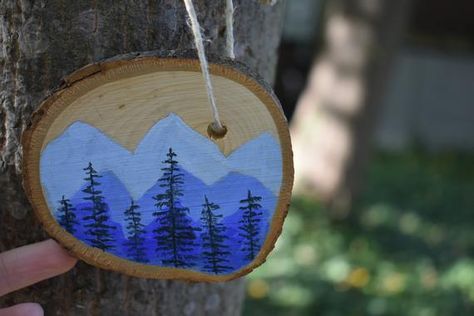 Tree and Mountains Wood Slice Ornament | Etsy Wood Painting Art, Wood Slice Art, Wood Slice Ornament, Painted Ornaments, Unique Ornament, Round Ornaments, Hand Painted Wood, Wood Slices, Wooden Ornaments