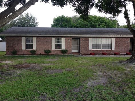 The front of my house needed a drastic facelift and some curb appeal. I really disliked how plain it looked, so this is what I came up with. Staining the brick, adding fresh landscaping and a newly built front porch pergola really seemed to do the trick. Hope you enjoy! These first two pictures are before. Very plain and unappealing. Before: Pic 2 I used a semi-transparent concrete stain (English Brick) from Home Depot to give the brick some life again. Here is a side-by-side com… Front Yard Pergola, Entry Pergola, Build A Front Porch, Pergola Over Deck, Yard Pergola, Pergola Plans Roofs, Transparent Concrete, Front Porch Pergola, Porch Pergola