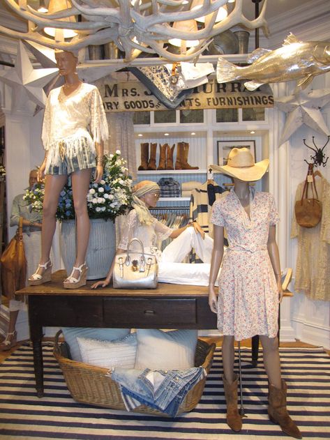 Whimsical florals paired with rugged cowboy boots create an authentic Western feel in our Aspen store Lighted Shelving, Joanna Levesque, Rugged Cowboy, Whimsical Florals, Clothing Store Displays, Antler Chandelier, Clothing Displays, Retail Inspiration, Boutique Decor