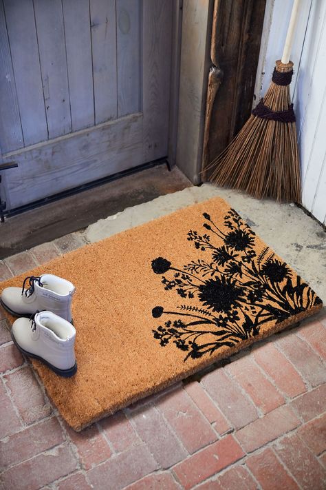 Hand-tufted using natural coir fibers, this durable doormat features a custom design using stencil plates. This terrain-exclusive doormat is fully biodegradeable, absorbs moisture, and is mildew resistant. Printed design may fade over time and is best if placed in a sheltered area or covered porch. Door Mats, Cute Door Mats, Door Mats Outdoor, Coir Mat, Coir Doormat, Covered Porch, Printed Design, Door Mat, Biodegradable Products