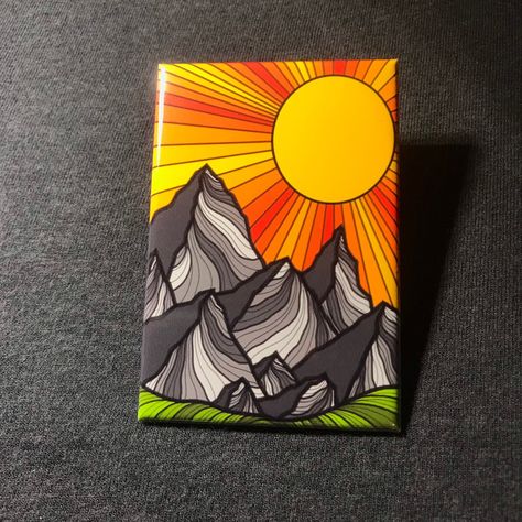 "This cute magnet features a hand drawn image of a psychedelic mountain range at sunrise!  Ideal for decorating your refrigerator or locker.  Ideal for decorating your refrigerator or locker. All magnets are MADE TO ORDER and designed/manufactured in my home studio.  Magnet making process: All images are hand designed by me. The image is printed on glossy photo paper, hand punched and then hand pressed using a professional magnet making machine. There is a plastic mylar laminating the photo, a m Magnet Making, Gifts For Hikers, Kitchen Fridge, Fridge Decor, Hippie Painting, Canvas Painting Designs, Cute Canvas, Painting Inspo, Art Inspiration Painting