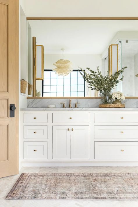 coastal luxury main suite reveal | kelsey leigh design co. Coastal Bathroom Vanity, Modern Coastal Kitchen, Coastal Bathroom Design, Rattan Chandelier, Luxury Closets Design, Closet Cabinets, Coastal Bathrooms, Main Bathroom, Modern Coastal