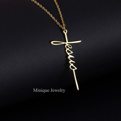 Express your faith with a Solid Sterling Silver or 18K Gold Plated Jesus Cross Necklace. The minimalist Jesus script necklace has a simple yet elegant look! Made in NC, USA, and shipped the next day! ✝️Material: Sterling Silver ✝️Finish: High Polished Rhodium or 18K Gold plated ✝️Nickel Free, Tarnish Resistant ✝️Dimensions: Large Size: Height: 44 mm (1.73 inches) Small Size: Height: 27 mm (Slightly more than an inch). Width: 14 mm ✝️The chain length is 18 inches Each item comes in a gift box, re Elegant Cross Necklace, God Jewellery, Gold Cross Necklace For Women, Christian Necklaces, Christian Items, Jesus Cross Necklace, Christian Cross Necklace, Jesus Gift, Christian Accessories