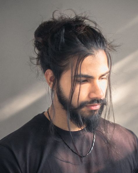 35 Man Bun Styles For Men Ideas For 2024 Hairstyles For Mens Long Hair, Undercut Bun Mens, Long Hair Men Portrait, Long Hair Sides Shaved Men, Men Wedding Hairstyles Long, Long Haired Men Hairstyles, Long Hair Manbun, Prince Hair Styles, Black Man Bun Hairstyles