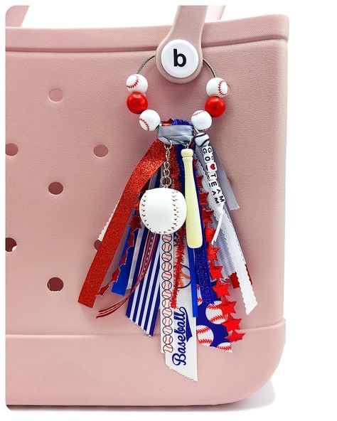 PRICES MAY VARY. ⚾ Elevate Your Style with Sporty Glamour: Our Bogg Bag accessory combines a trendy tassel crafted from different ribbons, a soccer charm, and eye-catching wooden beads. This handmade bogg bag charm instantly adds a touch of sporty glamour to any bag, making heads turn wherever you go. 💯 Premium Quality Craftsmanship: Our handmade Bogg Bag Charm is meticulously crafted using high-quality materials and detailed workmanship. From the intricately designed tassel to the durable base Bogg Bag Charms, Bogg Bag Accessories, Team Mom Baseball, Tote Bag Accessories, Baseball Accessories, Football Diy, Tassel Crafts, Custom Lanyards, Bogg Bag