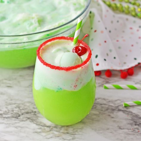 This Grinch Punch is the perfect drink for your holiday parties! Filled with the delicious flavors of lime sherbet, Sprite and Green Berry Punch, this fun Christmas drink will have everyone coming back for seconds! Grinch Punch Recipe, Grinch Recipes, Fun Christmas Drinks, Creamsicle Milkshake, Grinch Punch, Sherbet Punch, Lime Sherbet, Alcoholic Punch, Christmas Punch Recipes