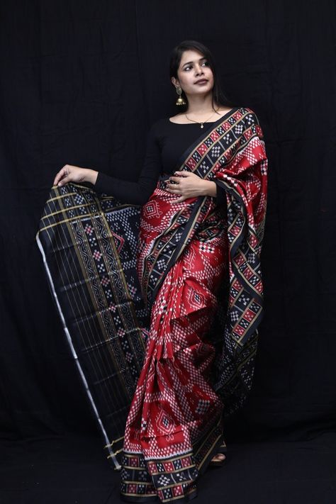 Weaver communities of Maniabandha and Nuapatana of Odisha traditionally weave this kind of saree. Common motifs are star, temple, conch, rudraksh, fish, chakra, lotus etc. The inspiration of all its designs comes from nature. It is the best of single ikat; one of warp and weft is tied and dyed prior to weaving. The borders and the pallas have tremendous variety and each one of them is attractive and praiseworthy. Specification:  Occasion: Festive Wear Fabric: Mulberry Silk,  Primary Color: Red S Odisha Traditional Dress, Sambalpuri Dress Design, Chakra Lotus, Sambalpuri Saree, Formal Saree, Western Outfits Women, Festive Wear, Ikkat Saree, Saree Dress