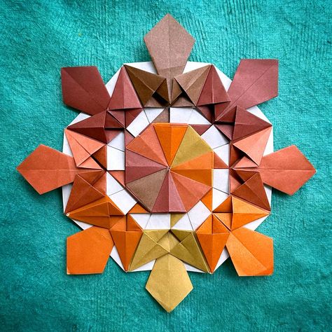 A new modular origami mandala, designed and folded by me. I plan to include it in my next book, assuming I sell enough of my first book, Magnificent Origami Mandalas (available on Amazon) #morigami #origami #origamimandala #modularorigami Origami Mandala, Modular Origami, Origami, How To Plan, Design, Mandalas