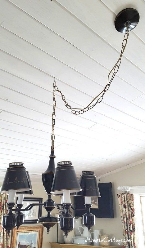 How to Make a Chandelier Longer - SIMPLE DECORATING TIPS Make A Chandelier, Chandelier Hook, Swag Pendant Light, How To Make A Chandelier, Swag Chandelier, Chandelier Chain, Cottage Lighting, Outdoor Chandelier, Swag Light