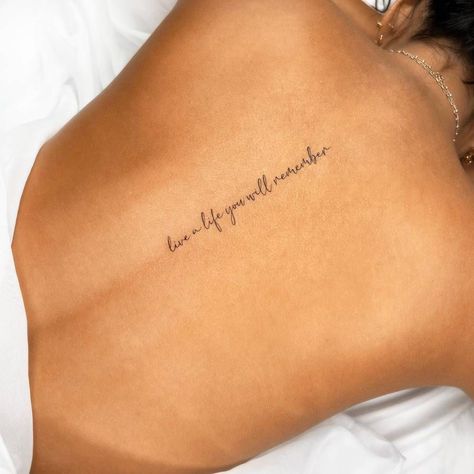 For Life Tattoo Words, Love A Life You Will Remember Tattoo, Tattoo Inspo Words, Best Qoute Tattoo, Spine Tattoo Sayings For Women, Back Phrase Tattoo Women, Quote Tattoo On Back, Life Motto Tattoos, Ive Got Your Back Tattoos