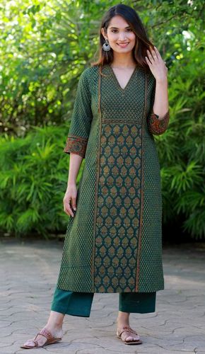 Elevate your style with this Forest Green Ajrakh Printed Kurta. Its tea-length design, V-shaped neck, and below-elbow-length sleeves make it a perfect blend of elegance and comfort, ideal for various occasions. Kurti Design Latest, Printed Kurti Designs, Cotton Dress Pattern, डिजाइनर कपड़े, Silk Kurti Designs, Stylish Kurtis Design, New Kurti Designs, Ajrakh Prints, Green Colours