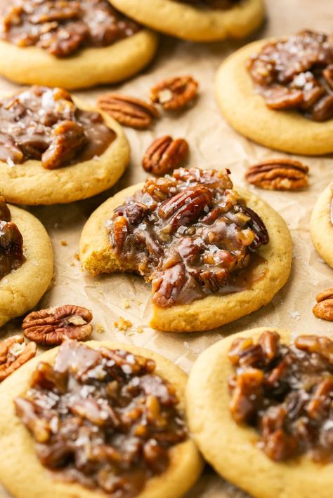 These Pecan Pie Cookies have a soft and chewy sugar cookie dough base with a gooey, sweet, crunchy pecan pie filling. It's Pecan Pie in a hand-held treat! Perfect for the holiday season of cookie exchanges! #pecanpie #pecanpiecookies #krollskorner #holidaycookies #cookiebox #pecanpierecipes #christmascookies #thanksgivingdesserts Candied Pecan Cookies, Cranberry Cheesecake Cookies, Pecan Pie Ritz Cookies, Pecan Pie Thumbprint Cookies, Craisin Cookie Recipes, Pecan Pie Ritz Crackers, Cookie Walk Cookies, Ideas For Christmas Cookies, Pumpkin Pecan Cookies