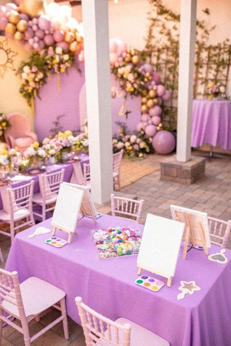 The Big List of 30 Disney Party Themes - Lady Celebrations Tangle Party Ideas, Tangled Inspired Birthday Party, Rapanzul Birthday Party, Tangled Pool Party, Rapunzel Tea Party, Tangled Birthday Party Aesthetic, Tangled Themed Bachelorette Party, Rapunzel 1st Birthday Party, Tangle Birthday Party Ideas