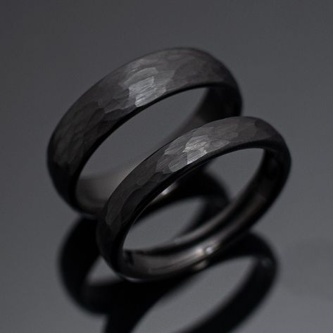 Your wedding ring set order includes + One 6mm Black Hammered Obsidian-styled tungsten Wedding Band + One 4mm Black Hammered Obsidian-styled tungsten Wedding Ring + Both Come inside Wax Sealed Ring Boxes. Limited Time: Free Matching Set of Black Silicone Bands w/ Order. *Durable - Incredibly Scratch-Resistant to always look great. *Comfort-fit & Weighty - Designed to fit well and feel good in your hand. *Made to order - Every ring we ship is unique and one-of-a-kind. *6mm - Most popular standard Dark Grey Wedding Band Men, Black Hammered Wedding Band, Mens Obsidian Wedding Ring, Black Titanium Wedding Band, Couple Wedding Rings Black, Wedding Ring Men Black, Obsidian Mens Wedding Band, Matching Black Wedding Bands, Silicone Mens Wedding Band