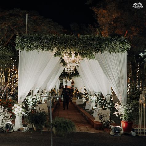 Step into a dream—white drapes, lush greenery, and chandeliers create a mesmerizing entrance to the night. 🌙🤍✨ . Bride & Groom : @ramonamariaroberts + @rory_8888 Plan, style & execution : @weddingsbymostash . Get in touch with us Today! . #weddingsbymostash #mostash #weddingplannersinbelgaum #weddecor #wedmegood #weddingprops #eventdecor #eventplanner #goaweddings #entrancetunnel #wedding #entrancedecor #groom #bride #eventstylist #catholicwedding #whitedecor #florals #floraltreatment #we... White Drapes, Catholic Wedding, Wedding Props, Entrance Decor, White Decor, Event Planner, Bride Groom, Event Decor, Entrance