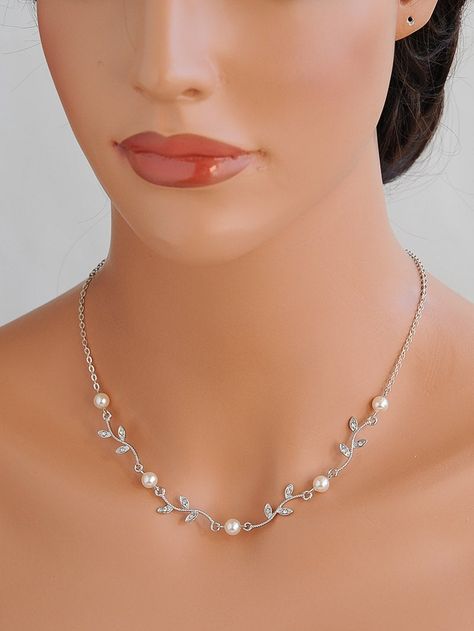 "Original Design by Glamorous Bijoux® This listing is for the KACEY Necklace - Please choose from one of the following options: 16\" Necklace without backdrop 18\" Necklace without backdrop 20\" Necklace without backdrop 16\" Necklace w/ backdrop 18\" Necklace w/ backdrop 20\" Necklace w/ backdrop Beautiful bridal necklace features dainty vintage style leaf vine filigree. Carefully encrusted with tiny rhinestones and embellished with hand-wrapped Swarovski pearls. Finished off with an extender a Jewelry For Sweetheart Neckline Wedding, Wedding Necklaces For Bride, Bride Necklace Wedding, Jewellery Charms, Bridal Jewelry Pearl, Leaf Filigree, Prom Necklace, Necklace Leaf, Bride Necklace