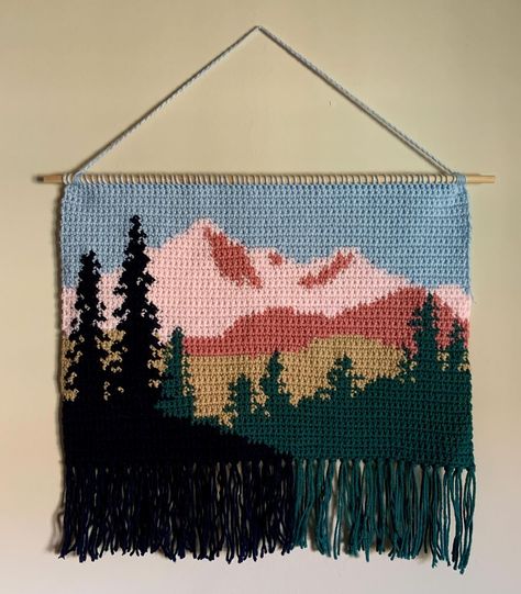 biggest tapestry I’ve made so far ⛰️ #crochet #crochettapestry #tapestrycrochet #crochetlandscape #fiberart Crochet Tapestry Landscape, Crochet Hanging Tapestry, Crochet Tapestry Room Decor, National Park Crochet, Large Crochet Tapestry, Crochet Camping Ideas, Ghibli Tapestry Crochet, Crochet Tapestry Ideas, Landscape Crochet