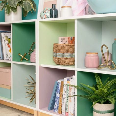 We're obsessed with the way Oh Joy has upgraded their basic cubby storage unit with splashes of color in each cube 🤩 Ikea Cube Shelves, Small Office Ideas, Small Home Office Ideas, Ikea Cubes, Cozy Seating Area, Colorful Apartment, Oh Joy, Cubby Storage, Small Office