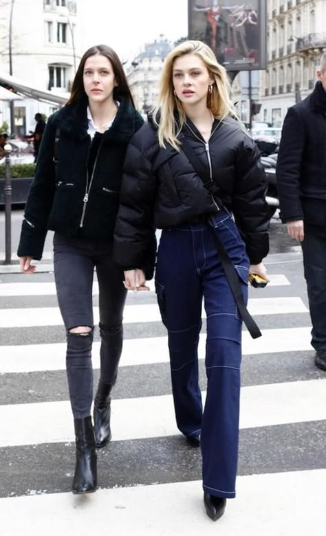 Nicola Peltz wearing a black cropped puffer jacket, white square neck cropped t-shirt, wide-leg cargo jeans, black platform ankle booties, and a black bum bag Cargo Jeans Black, Nicola Peltz, Nicolas Peltz, Cropped Puffer Jacket, White Square, Fall Fits, Coat Outfits, Black Platform, Cropped T Shirt