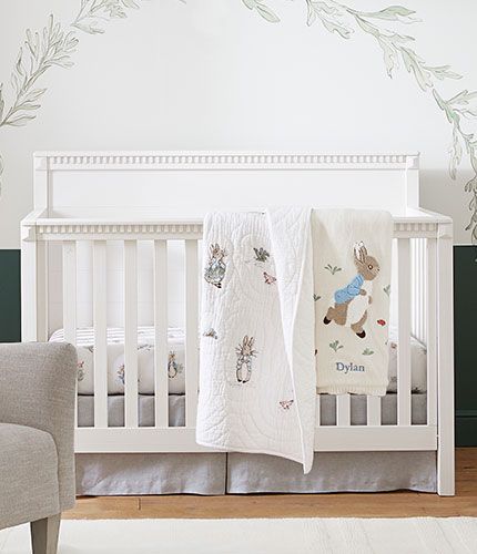 Designers & Friends | Pottery Barn Kids Academia Nursery, Dark Academia Nursery, Organic Baby Nursery, Luxe Nursery, Nursery Wall Shelf, Pottery Barn Baby, Crib Liners, Peter Rabbit Nursery, Rabbit Nursery