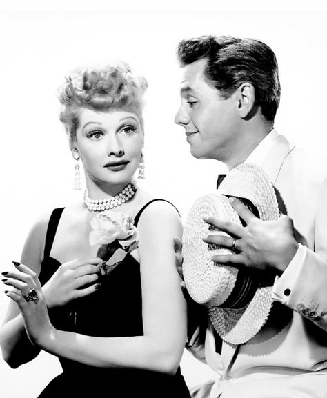 Lucy and Desi played a wacky, loving couple on TV, while their own off camera marriage was stormy. Santiago, Lucille Ball, Lucille Ball Costume, Lucille Ball Desi Arnaz, Lucy And Ricky, Best Tv Couples, Desi Arnaz, American Legend, Couple Picture Poses