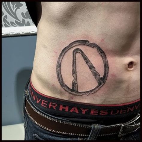 Weathered Style Design of Vault Symbol from Borderlands video game series Borderlands Tattoo, Simple Tats, Wolf Tattoo Sleeve, Video Game Tattoo, Loading Screen, Symbol Tattoo, Writing Tattoos, Gaming Tattoo, Symbol Tattoos