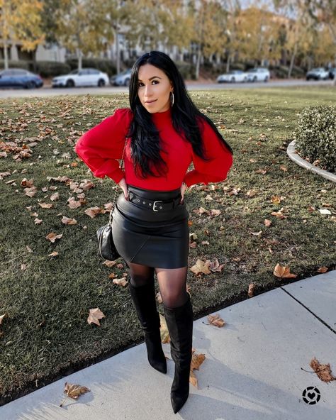 Edgy holiday outfit idea. Faux leather skirt size 00 (similar linked) Red sweater size xxs (similar linked) Opaque tights (in the smallest size) Black boots Quilted crossbody bag Gold jewelry http://liketk.it/33nLR #liketkit #LTKstyletip #LTKsalealert #LTKunder100 #LTKunder50 #LTKcurves #LTKshoecrush @liketoknow.it Black And Red Holiday Outfit, Red Leather Skirt Outfit Party, Red Sweater With Black Skirt, Red Leather Skirt Outfit Winter, Black Skirt And Red Top Outfit, Red Faux Leather Skirt Outfit, Red Shirt Black Skirt Outfits, Red Black And Gold Outfit Ideas, Black Faux Leather Skirt Outfit Winter