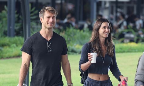 Glen Powell And Gigi Paris, Glen Powell Gigi Paris, Glen Powell Girlfriend, Gigi Paris, Glen Powell, At The Airport, Australia, Paris, Flowers