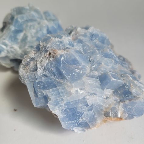 Some beautiful natural blue calcite I couldn't pass up #calcite #calcitecrystal #bluecalcite #rawgemstones #gemstoneshop #gemstoneseller #gemshop #smallbusiness #womanownedbusiness #gemstones #rockcollection #rocksandminerals #rockhound #rockshop #rockhounding #rockhounds #treatyoself #treatyourself #ineedthis #crystal #crystals #crystalvibes #crystalshop #crystalaesthetic #gemlover #crystalhealing Blue Celestite, Geode Stone, Crystal Vibes, Crystal Aesthetic, Grayish Blue, Gem Shop, Blue Calcite, Crystal Healing Stones, Calcite Crystal