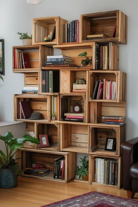 "Elevate your storage solutions with a DIY Wooden Crate Bookshelf! 🛠️📚 Perfect for organizing books, decor, and more in a rustic, creative way. 🌿✨ #DIYHome #WoodenCrates #BookshelfIdeas" Diy Bookshelf Wall Small Spaces, Creative Bookshelves Diy, Diy Display Shelves, Wooden Crate Bookshelf, Homemade Bookshelf, Diy Crate Bookshelf, Design Bookshelves, Homemade Bookshelves, Book Crate