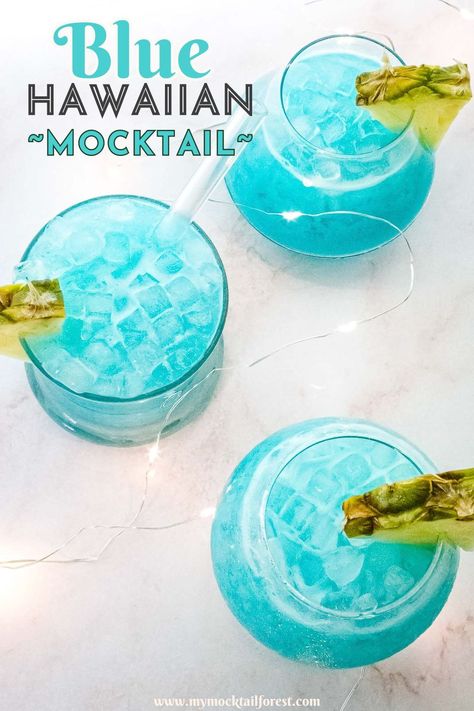 The Blue Hawaiian Cocktail is one of the best tropical drinks in the world a perfect frozen cocktail to enjoy in the summer. Essentially, this cocktail is a colorful variation of the popular Pina Colada. Blue Pina Colada Punch, Lilo And Stitch Cocktail, Virgin Blue Hawaiian Drink, Sweet 16 Party Drinks, Mamma Mia Mocktails, Hawaiian Mocktails Non Alcoholic, Fruity Mocktails Non Alcoholic, Blue Hawaiian Mocktail, Hawaiian Mocktail