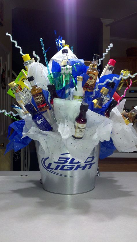 Shot bottle bouquet I made for my son's 21st birthday. Diy Father's Day Gift Baskets, Michelob Ultra Beer, Bottle Bouquet, Family Gift Baskets, Fathers Day Gift Basket, Christmas Gift Baskets Diy, Stag And Doe, 21st Bday Ideas, Beer Tower