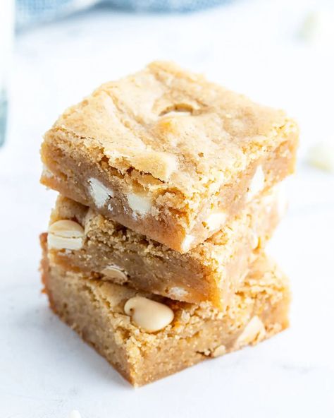 A stack of three white chocolate chip blondies. White Chocolate Chip Blondies, Brown Sugar Blondies, Chewy Blondies Recipe, Chocolate Blondies, White Chocolate Blondies, Chocolate Chip Blondies, Warm Desserts, White Chocolate Chip, Chewy Brownies