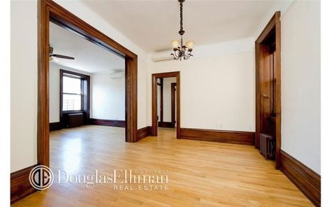 Light Flooring With Dark Trim, Wood Floors With Dark Trim, Dark Trim Light Floors, Dark Trim White Walls, Dark Floors White Walls, Black Baseboards, Stained Wood Trim, Dark Wood Trim, Stained Trim