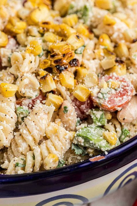 Close up shot of a bowl of Elotes pasta salad. Vegan Elote Pasta Salad, Mexican Street Corn Pasta Salad With Hot Cheetos, Elote Pasta Salad, Elote Pasta, Pasta Salad With Avocado, Femalefoodie Mexican Street Corn Pasta Salad, Grilled Sweet Corn, Avocado Pasta Salad, Salad With Avocado