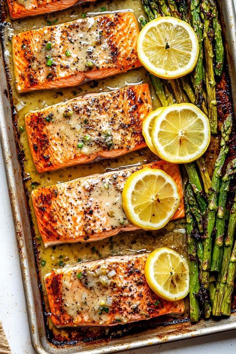 This one-pan baked garlic butter salmon is simple, quick, and delicious. It's perfect for both weeknight dinners and special occasions. Easy Salmon And Asparagus Recipes, Low Carb Baked Salmon Recipes, Best Oven Baked Salmon, Lemon Garlic Butter Salmon Baked, Easy Quick Salmon Recipes, Salmon Side Recipes, Salmon Dinner For Two, Baked Salmon And Asparagus Recipes, Easy Way To Cook Salmon