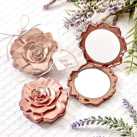 PRICES MAY VARY. Travel Makeup Mirror: Our beautiful rose design compacts feature a case made of hard molded plastic, finished in a dusty rose color. The cover's two dimensional molded 'petals' bring the beautiful rose blossom design to life. Cosmetic Mirror: The compact mirror opens with a side hinge to reveal a dual sided glass mirror inside and is ideal for makeup applications. Party Favor: This exquisite favor is presented in a clear display box with a white string elastic wrap and bow. Atta Sunglasses Favors, Party Favor Wedding, Candle Party Favors, Clear Gift Boxes, Travel Makeup Mirror, Rosé Theme, Bridal Shower Party Favors, Design Mirror, Realistic Rose